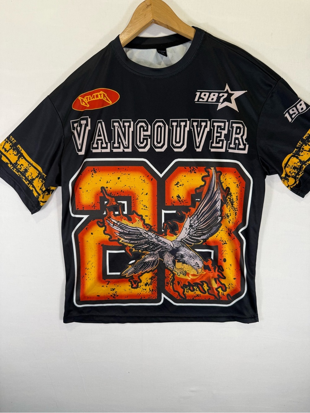 ROMWE Black Tee with Orange & Yellow Vancouver 23 Graphic